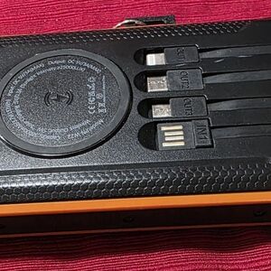 Portable Solar Power Bank with USB Ports - Black and Orange